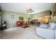 Spacious living room with hardwood floors and lots of natural light at 2014 Montego Ct, Oldsmar, FL 34677