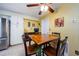 Charming dining area with wood table and chairs, adjacent to the kitchen at 2014 Montego Ct, Oldsmar, FL 34677
