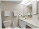 Bathroom with toilet and a corner sink at 1515 Pinellas Bayway S # 65, St Petersburg, FL 33715