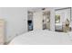 Main bedroom with a view and access to a bathroom at 1515 Pinellas Bayway S # 65, St Petersburg, FL 33715