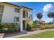 Condo exterior with private entrance and stairs at 1515 Pinellas Bayway S # 65, St Petersburg, FL 33715