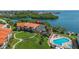 Aerial view of condo building near waterfront amenities at 1515 Pinellas Bayway S # 65, St Petersburg, FL 33715