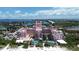 Aerial view of Don CeSar Hotel, pools, and beach at 1515 Pinellas Bayway S # 65, St Petersburg, FL 33715