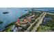Wide aerial view of waterfront property and surrounding area at 1515 Pinellas Bayway S # 65, St Petersburg, FL 33715