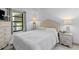 Bedroom with a double bed and window at 1515 Pinellas Bayway S # 65, St Petersburg, FL 33715