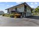 Two-story building with balconies and landscaping at 1515 Pinellas Bayway S # 65, St Petersburg, FL 33715