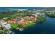 Aerial view of condo community near waterfront and tennis court at 1515 Pinellas Bayway S # 65, St Petersburg, FL 33715