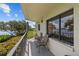 Relaxing balcony overlooking waterfront with table and chairs at 1515 Pinellas Bayway S # 65, St Petersburg, FL 33715