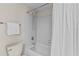 Clean bathroom with a shower/tub combo and white tile at 1515 Pinellas Bayway S # 65, St Petersburg, FL 33715
