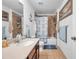 Clean bathroom with a nautical theme and a tub shower combo at 116 Caladium Ct, Bradenton, FL 34212