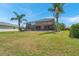 Large backyard with a pool and plenty of green space at 116 Caladium Ct, Bradenton, FL 34212