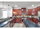 Modern kitchen with granite countertops and stainless steel appliances at 116 Caladium Ct, Bradenton, FL 34212