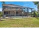 Relaxing pool and patio area with a screened enclosure at 116 Caladium Ct, Bradenton, FL 34212