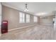 Spacious dining room with hardwood floors and neutral walls at 116 Caladium Ct, Bradenton, FL 34212