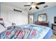 Spacious bedroom with double doors leading to a bathroom and large closet at 116 Caladium Ct, Bradenton, FL 34212