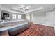 Bright bedroom with wood floors and large windows at 116 Caladium Ct, Bradenton, FL 34212