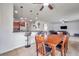 Open concept dining room with kitchen and living room views at 116 Caladium Ct, Bradenton, FL 34212