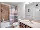 Clean bathroom with shower/tub combo, vanity, and tile flooring at 116 Caladium Ct, Bradenton, FL 34212