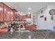Modern kitchen with granite countertops and stainless steel appliances at 116 Caladium Ct, Bradenton, FL 34212