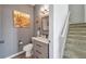 Small bathroom with gray walls and modern vanity at 116 Caladium Ct, Bradenton, FL 34212