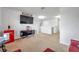 Spacious bonus room with TV and plenty of space for lounging at 116 Caladium Ct, Bradenton, FL 34212
