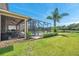 Screened pool and patio area, perfect for outdoor entertaining at 116 Caladium Ct, Bradenton, FL 34212