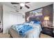 Comfortable bedroom with ceiling fan, window, and ample closet space at 116 Caladium Ct, Bradenton, FL 34212