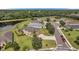 Luxury home community with houses surrounding a pond at 116 Caladium Ct, Bradenton, FL 34212