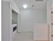 Convenient laundry area with washer, dryer, and cabinets at 4654 Mirabella Ct, St Pete Beach, FL 33706