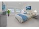 Bright and airy bedroom with high ceilings and large windows at 4654 Mirabella Ct, St Pete Beach, FL 33706