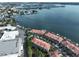 Aerial view highlighting waterfront location and boat slips at 4654 Mirabella Ct, St Pete Beach, FL 33706