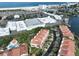 Aerial view showing location of property near beach, shopping and marina at 4654 Mirabella Ct, St Pete Beach, FL 33706