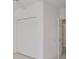 Large bedroom closet with double doors and built in shelving at 4654 Mirabella Ct, St Pete Beach, FL 33706