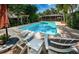 Pool with lounge chairs, offering a relaxing outdoor space at 311 Sunset N Dr, St Petersburg, FL 33710