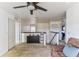 Spacious loft area with ceiling fan and access to bedrooms at 8556 Southern Charm Cir, Brooksville, FL 34613