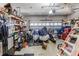 Garage with shelving and multiple vehicles at 8556 Southern Charm Cir, Brooksville, FL 34613