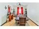 Spacious dining area with a large table and hardwood floors at 8556 Southern Charm Cir, Brooksville, FL 34613