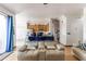 Living room with view of kitchen and access to backyard at 8556 Southern Charm Cir, Brooksville, FL 34613