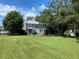 Spacious backyard with lush green lawn at 62 Emerald Bay Dr, Oldsmar, FL 34677