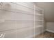 Large walk-in pantry with wire shelving for ample storage at 2505 Arch Ave, Oldsmar, FL 34677