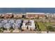 An aerial image showing a beachfront property with a pool and ample parking at 16333 Gulf Blvd # 206, Redington Beach, FL 33708