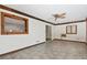 Living room with wood beam accents and tile floors at 1618 Valencia St, Clearwater, FL 33756