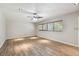 Spacious living room featuring hardwood floors and neutral walls at 1618 Valencia St, Clearwater, FL 33756