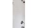 White subway tile shower with updated fixtures at 1618 Valencia St, Clearwater, FL 33756