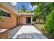 Back patio with sliding glass door access at 1618 Valencia St, Clearwater, FL 33756