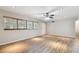 Bright living room with hardwood floors and lots of natural light at 1618 Valencia St, Clearwater, FL 33756