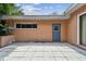 Back patio with concrete tile flooring at 1618 Valencia St, Clearwater, FL 33756