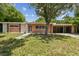 Front view of a midcentury ranch home at 1618 Valencia St, Clearwater, FL 33756