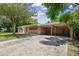 Neat Ranch home with carport and driveway at 1618 Valencia St, Clearwater, FL 33756