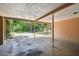 Covered carport offering parking and backyard views at 1618 Valencia St, Clearwater, FL 33756